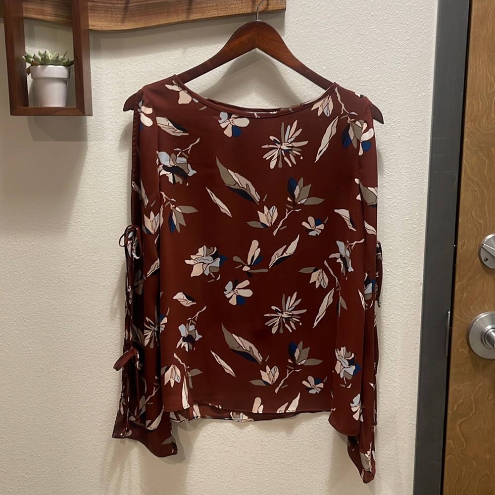 Floral blouse with ties on arms